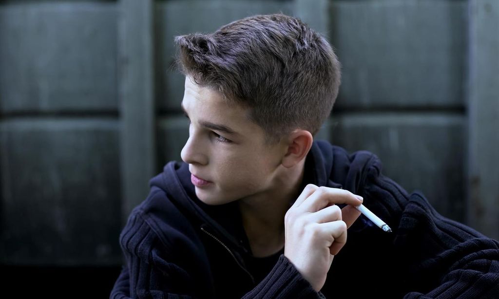 ni o fumando