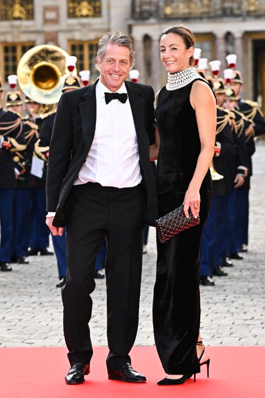 Hugh Grant y Elisabet Eberstein en el banquete de Estado en Versalles
