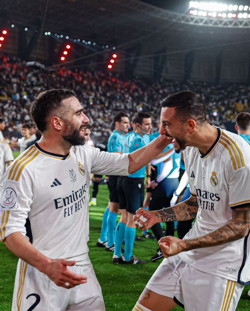 Dani Carvajal y Joselu celebran juntos uno de los triunfos del Real Madrid