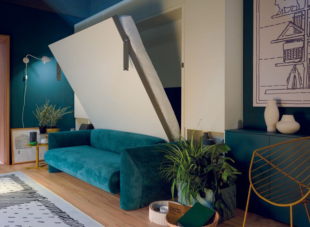 Ambiente de salón que alberga una cama escamoteable