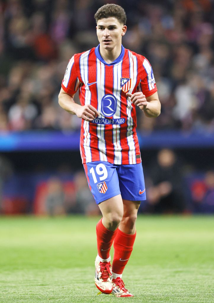 Julian Alvarez of Atletico Madrid running during the UEFA Champions League 2024/25 UEFA Champions League 2024/25 Round of 16 second leg match between Atletico de Madrid and Real Madrid C.F. at Estadio Civitas Metropolitano on March 12, 2025 in Madrid, Spain
