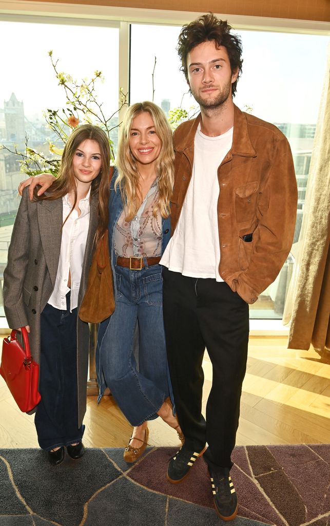 LONDON, ENGLAND - APRIL 01: (L to R) Marlowe Sturridge, Sienna Miller and Oli Green attend Savannah Miller's Bridal Ballerina Breakfast at Four Seasons Tower Bridge on April 1, 2025 in London, England. (Photo by Dave Benett/Getty Images for Savannah Miller Bridal)
