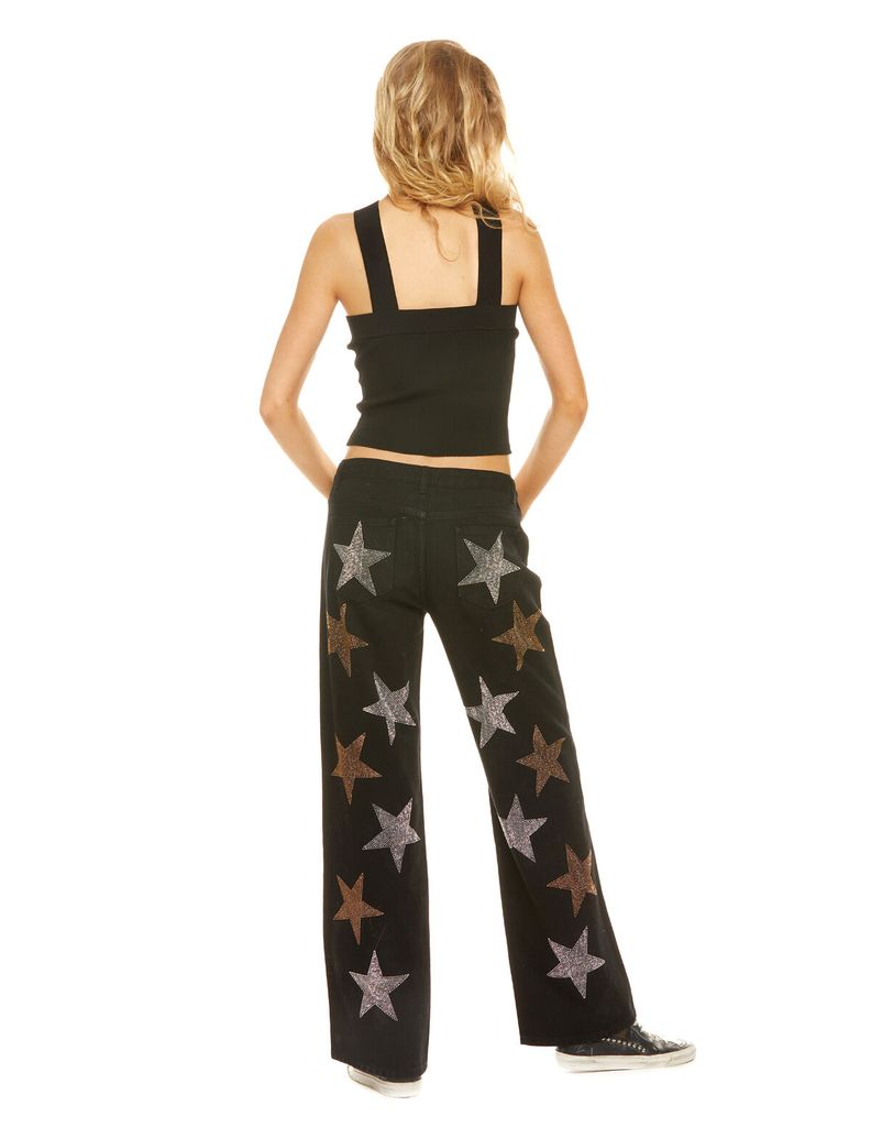 Vaquero negro con estrellas de Nícoli (32,99 euros)