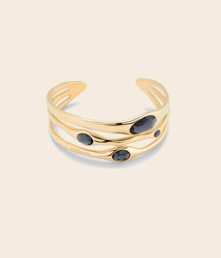 Pulsera dorada con piedras azules de Uno de 50