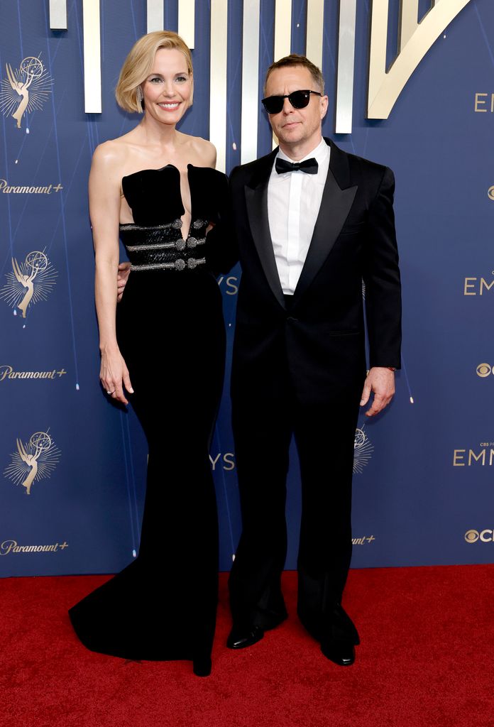 LOS ANGELES, CALIFORNIA - SEPTEMBER 14: (L-R) Leslie Bibb and Sam Rockwell attend the 77th Primetime Emmy Awards at Peacock Theater on September 14, 2025 in Los Angeles, California. (Photo by Frazer Harrison/Getty Images)