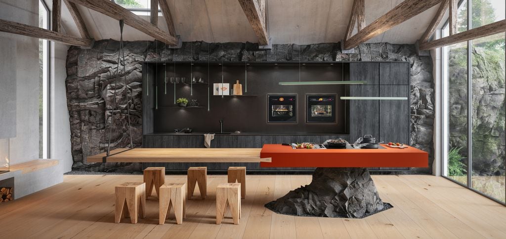 Cocina de estética moderna y caprichosa, con comedor en madera