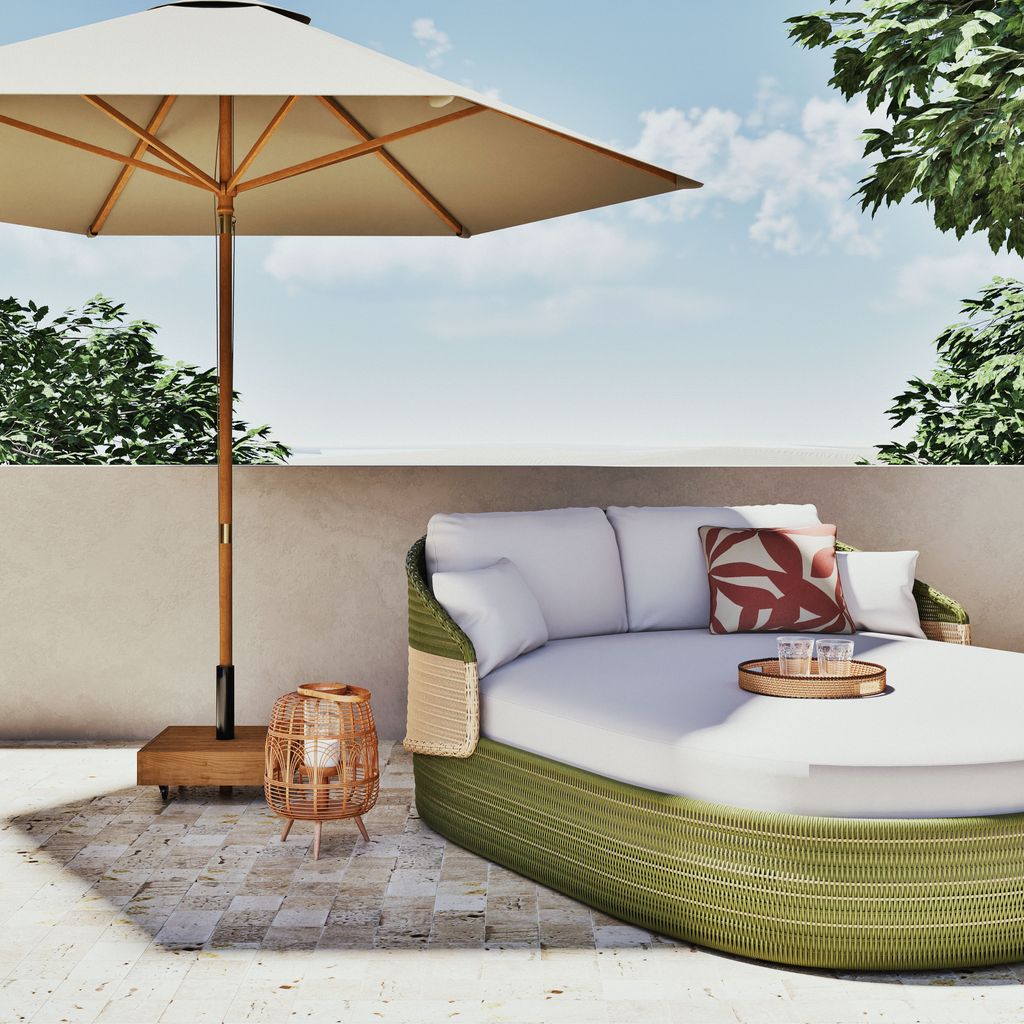Rincón con sombrilla y daybed de exterior