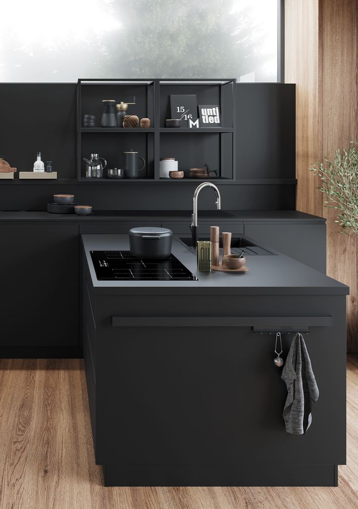 Cocina con muebles negros