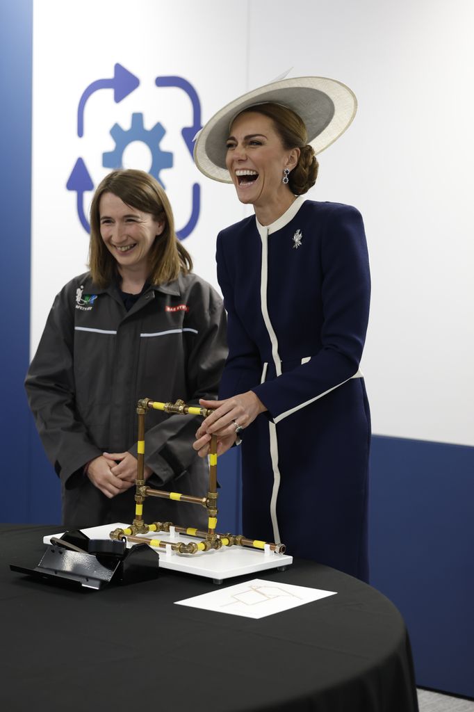 The Princess of Wales, known as the Duchess of Rothesay when in Scotland, meet with apprentices and graduates during a visit to the BAE Systems' Shipbuilding Academy to at the BAE Systems shipyard in Scotstoun, Glasgow. Picture date: Thursday May 22, 2025. *** Local Caption *** .