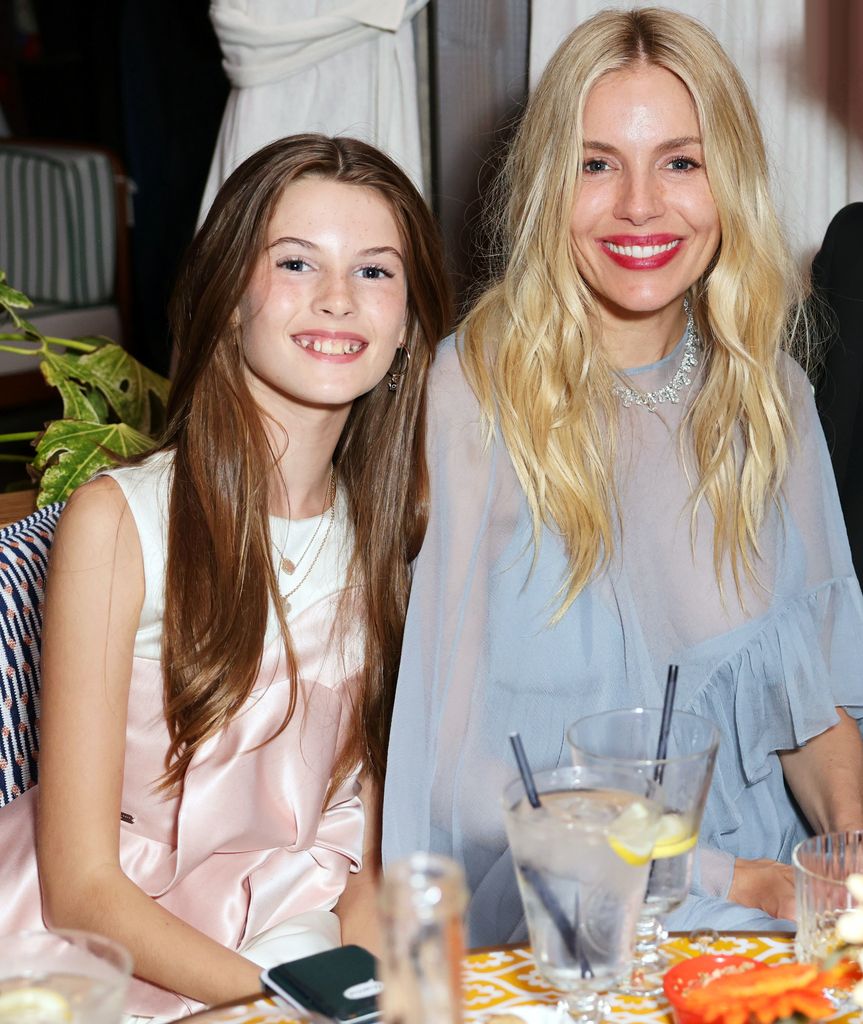 CANNES, FRANCE - MAY 19: (L to R) Marlowe Sturridge, Sienna Miller and Oli Green attend the "Horizon: An American Saga" after-party presented by Veuve Clicquot at Lucia Cannes during the 77th Annual Cannes Film Festival on May 19, 2024 in Cannes, France. (Photo by Dave Benett/Getty Images for Nikki Beach Hospitality Group)