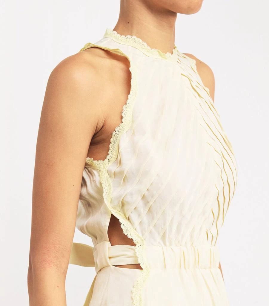 Vestido de lino y encaje de Sandro.