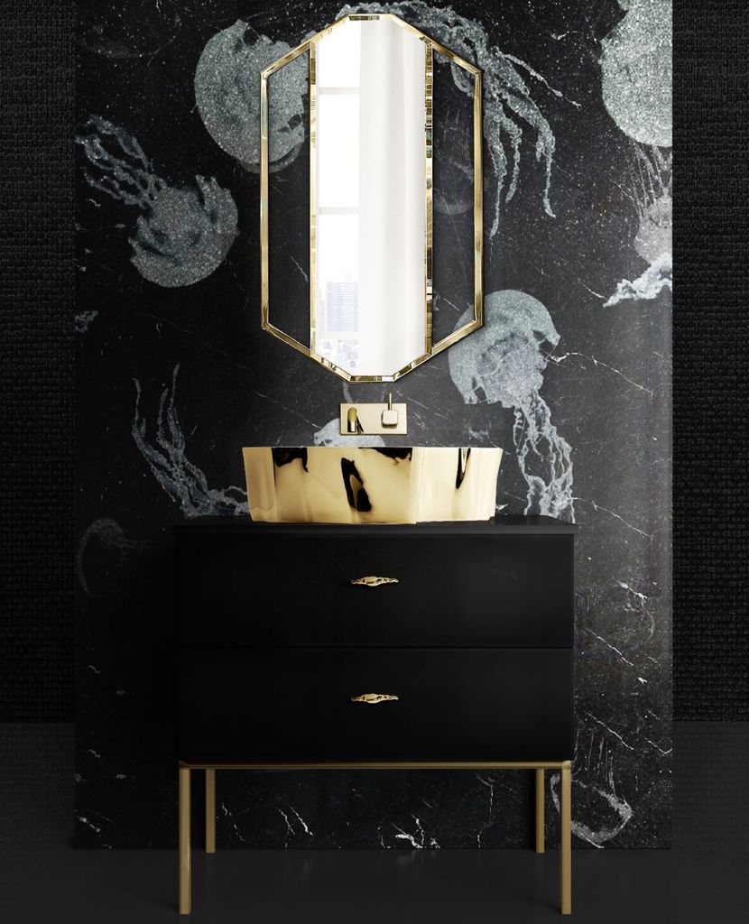 Cuarto de baño decorado en negro y dorado