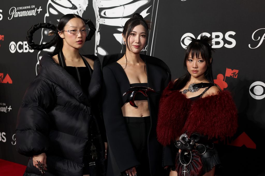 De izquierda a derecha: Audrey Nuna, Ejae y Rei Ami (HUNTR/X)