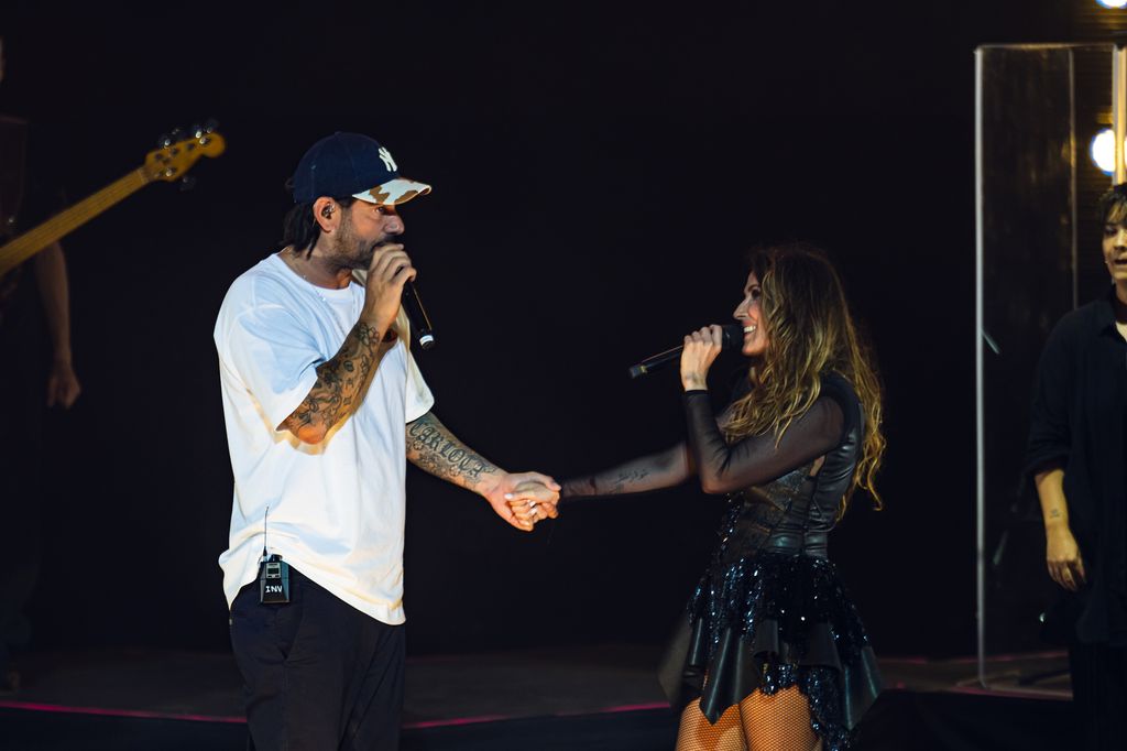 Melendi, con Malú en el escenario