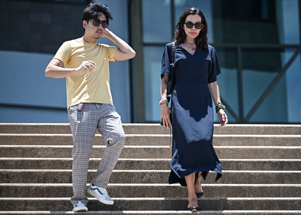 Silvia Bronchalo (R) leaves court after her son Daniel Sancho Bronchalo was handed a life sentence for the murder of Colombian plastic surgeon Edwin Arrieta Arteaga on the island of Koh Pha Ngan in August 2023, at the Koh Samui Provincial Court on August 29, 2024. (Photo by Lillian SUWANRUMPHA / AFP) (Photo by LILLIAN SUWANRUMPHA/AFP via Getty Images)