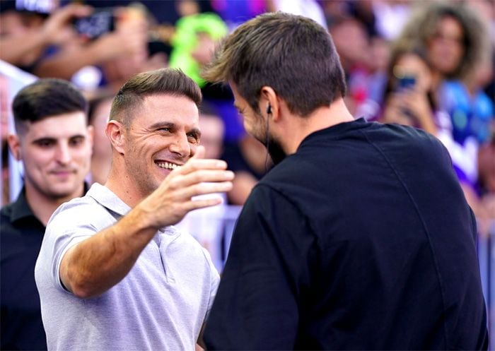 Gerard Piqué y Joaquín Sánchez