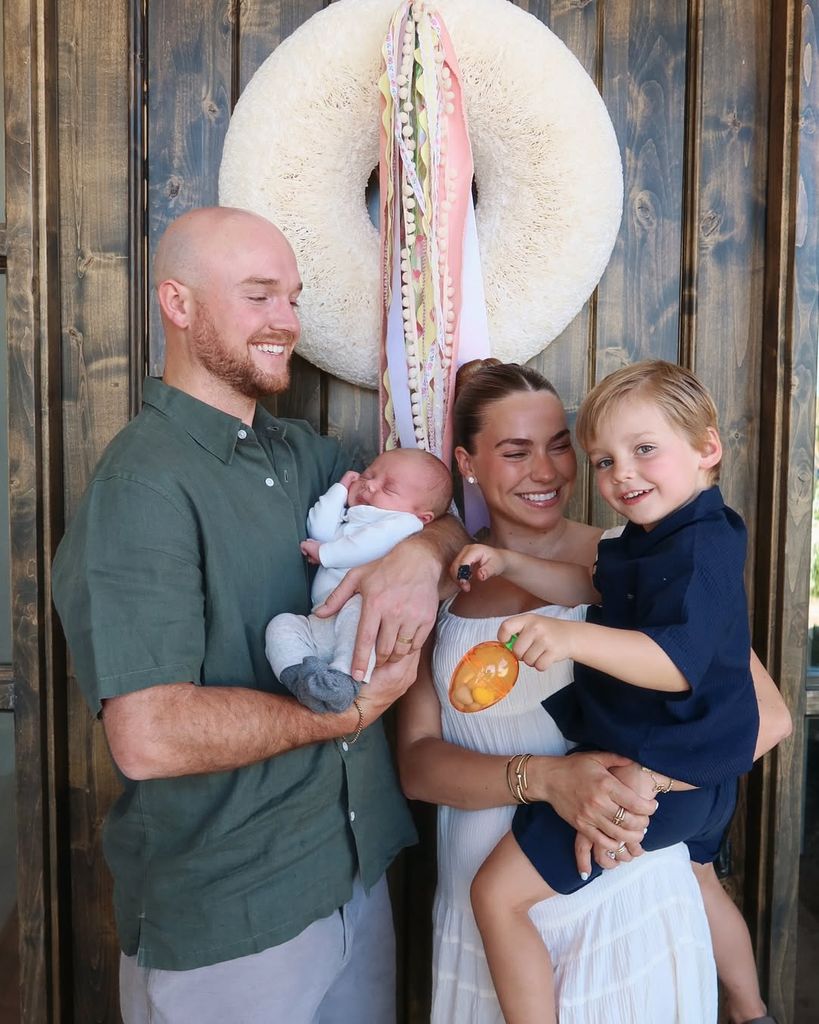 El matrimonio con sus dos hijos, Trigg y Theodore