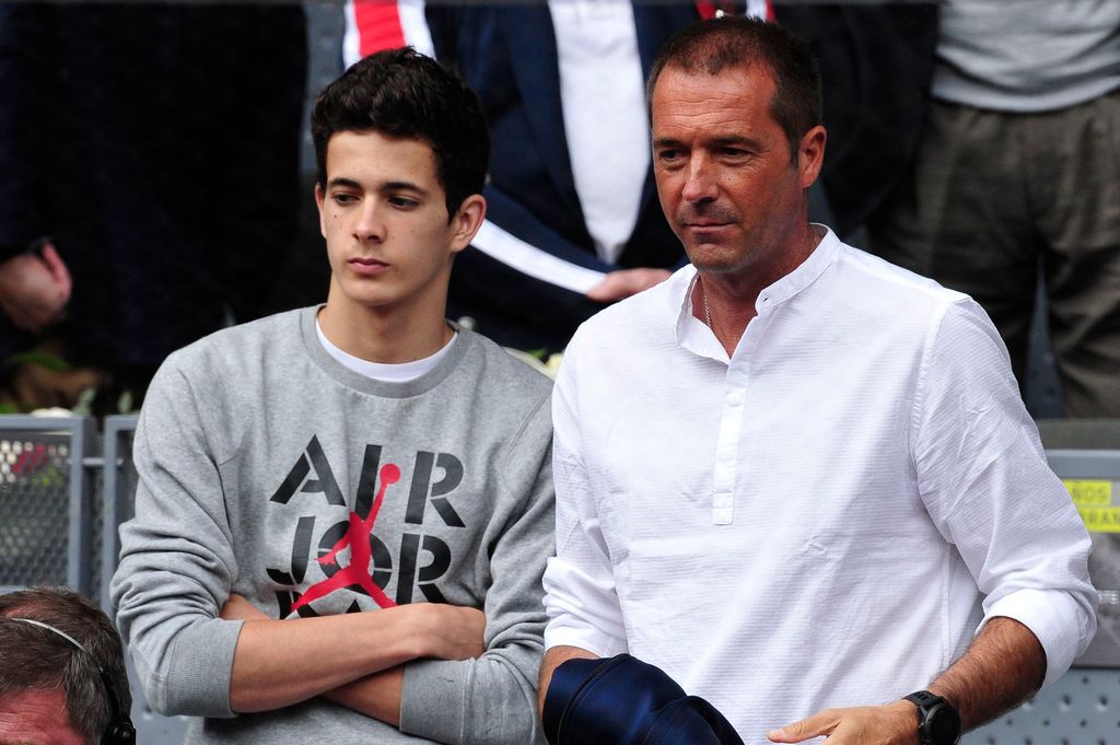 Manu Carreño y su hijo Sergio viendo a Nadal en la semifinal del Mutua Madrid Open de Tenis. 07/5/2016