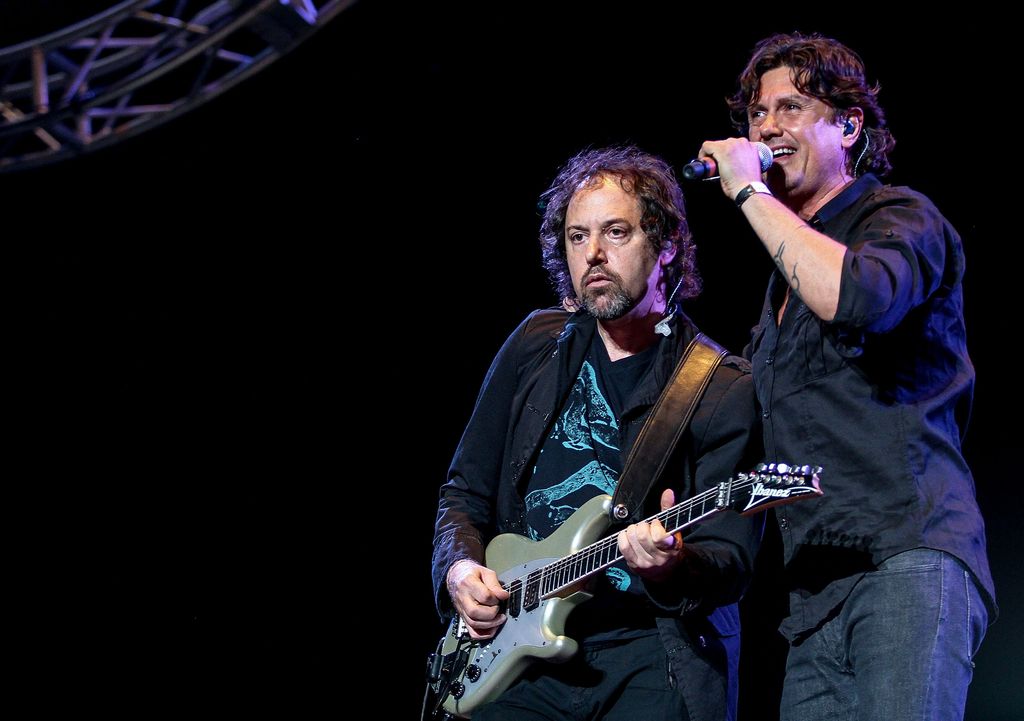 MEXICO CITY, MEXICO - MAY 26: Guitarrist Alejandro Marcovich and singer Saul Hernandez of Caifanes perform during the Wirikuta Fest 2012 at Foro Sol on May 26, 2012 in Mexico City, Mexico. (Photo by Victor Chavez/WireImage)