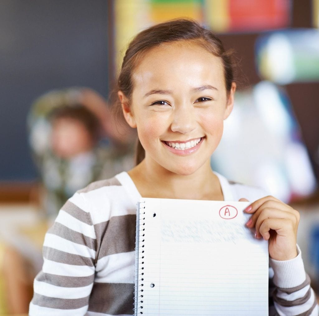 Sweet girl holding paper