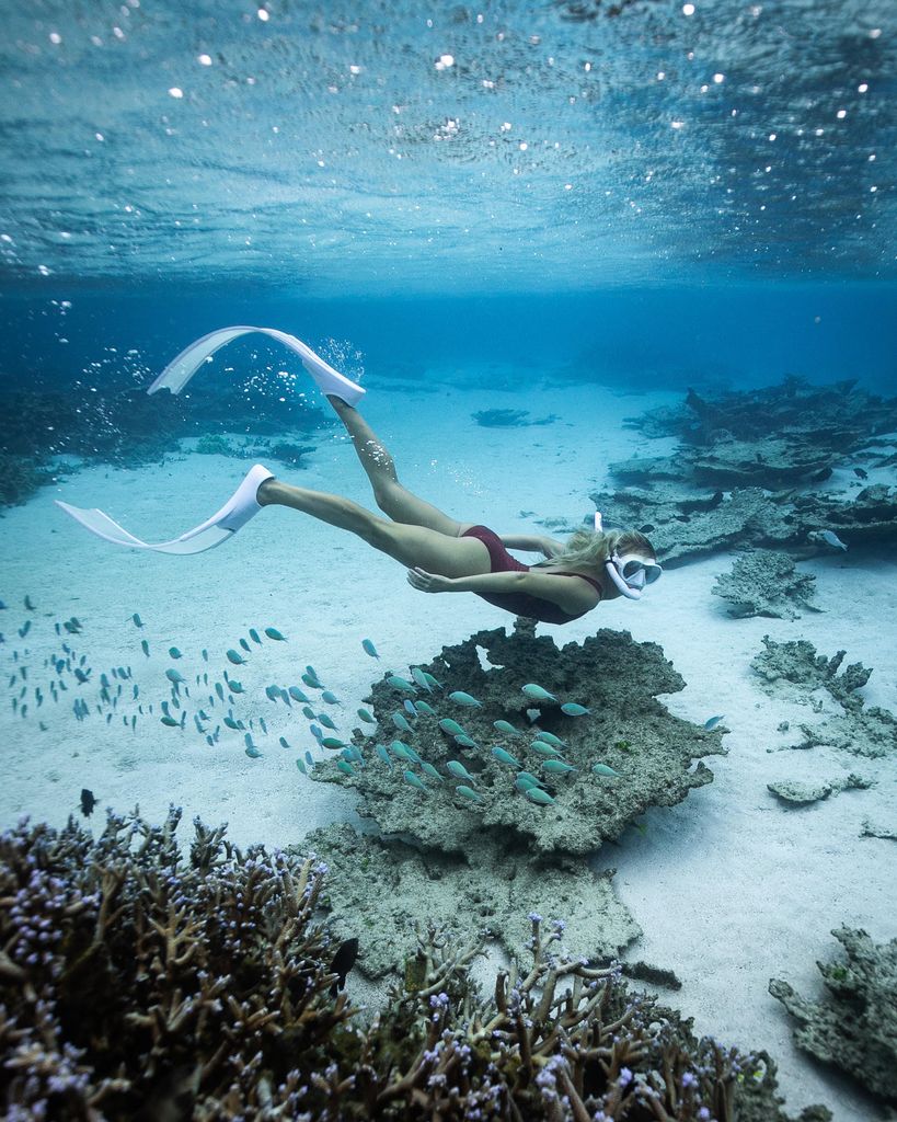 Mujer buceando en Isla Mauricio