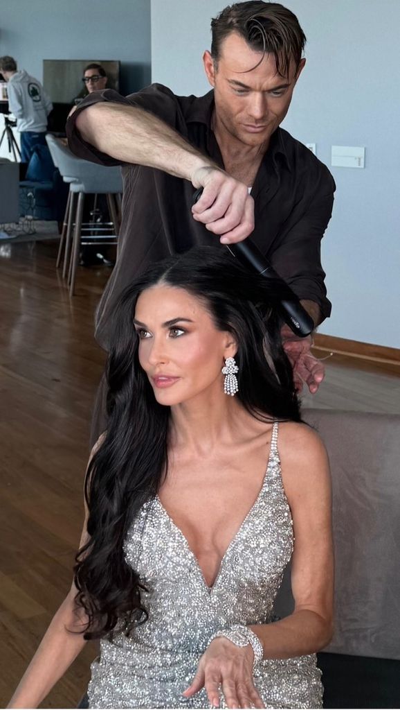 Dimitris y Demi Moore