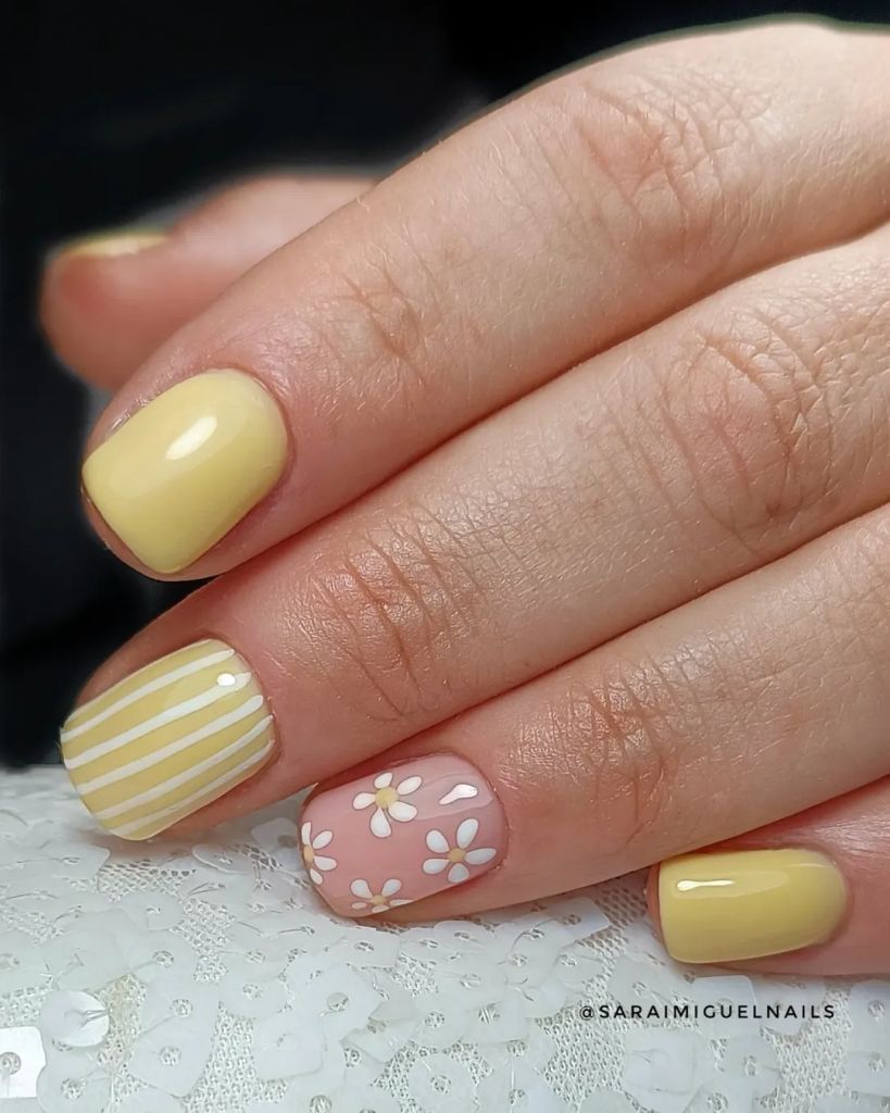 manicura con fusión de diseños en tonos pastel