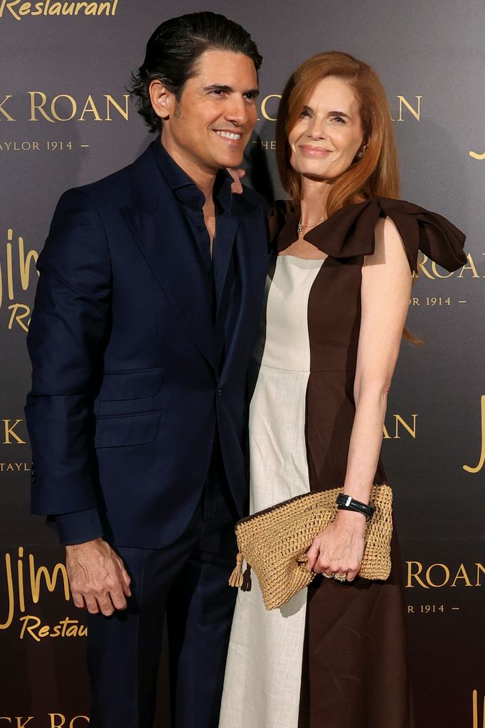 Olivia de Borbón y su marido, Julián Porras-Figueroa, en la celebración del primer aniversario de 'Black Roan', la firma de sastrería del empresario