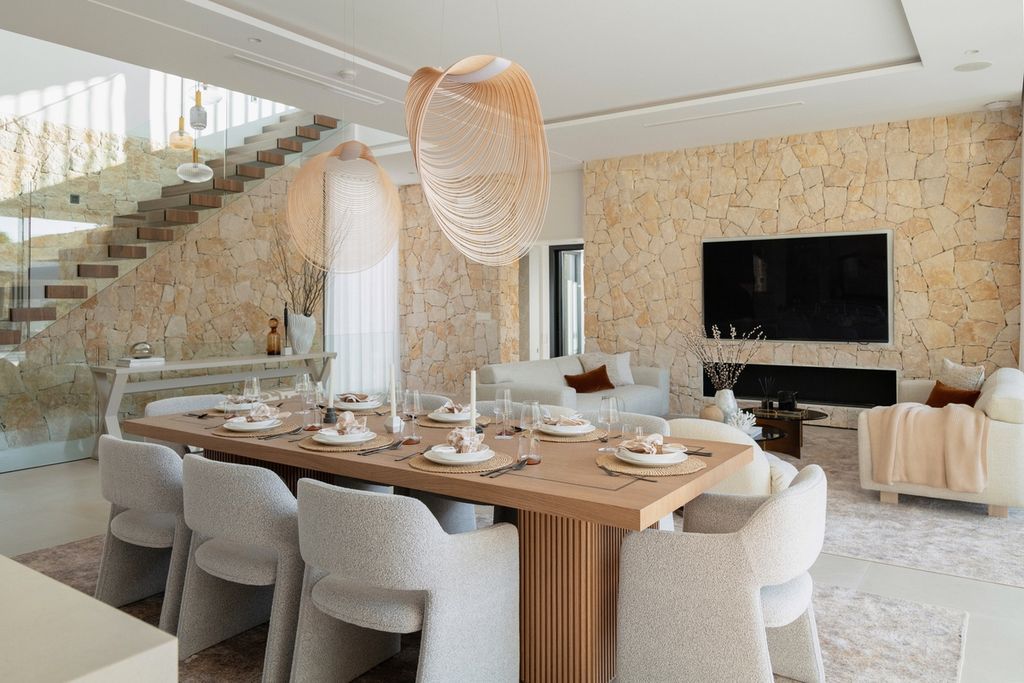 Comedor para ocho en el que la mesa de comedor de 3 metros es protagonista