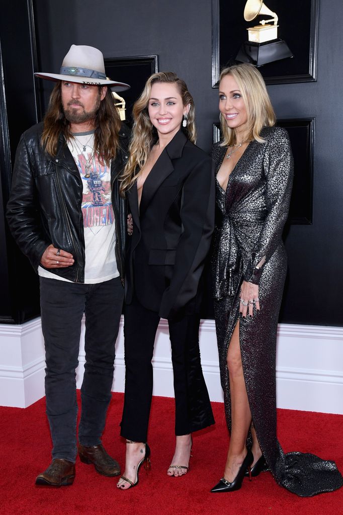 LOS ANGELES, CA - FEBRUARY 10:  Billy Ray Cyrus, Miley Cyrus and Tish Cyrus attend the 61st Annual GRAMMY Awards at Staples Center on February 10, 2019 in Los Angeles, California.  (Photo by Amy Sussman/FilmMagic)