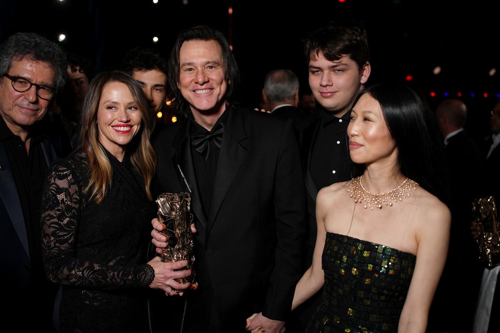 Jim Carrey y Min Ah, cogidos de la mano, 7 meses antes de su boda en los premios Cesar de Francia