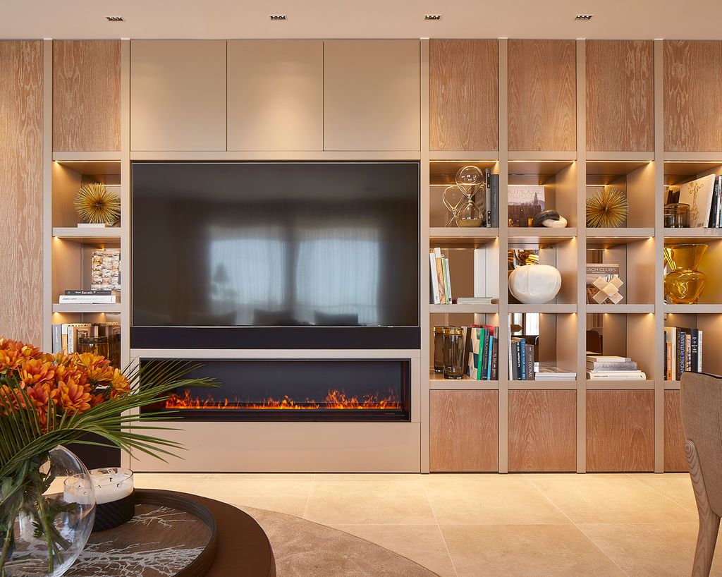 Librería con chimenea y televisor integrados