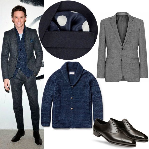 El chico del momento, Eddie Redmayne, con un look perfecto para una cita romántica: traje jaspeado en gris, camiseta azul y cardigan de punto grueso en color marino. 