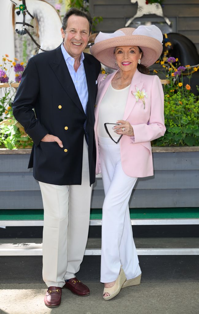 Joan Collins y Percy Gibson