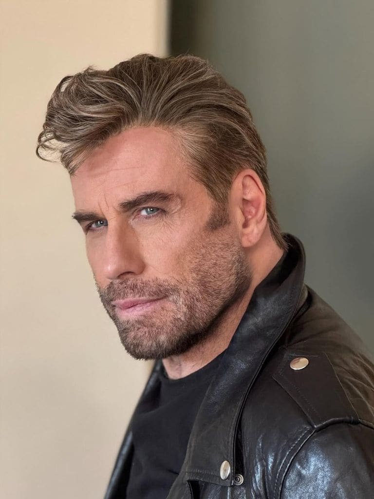 john travolta con tupe