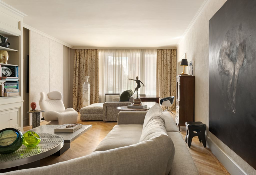 Dos áreas conforman este estiloso salón, la de recibir y compartir y la de calma o mirar la televisión