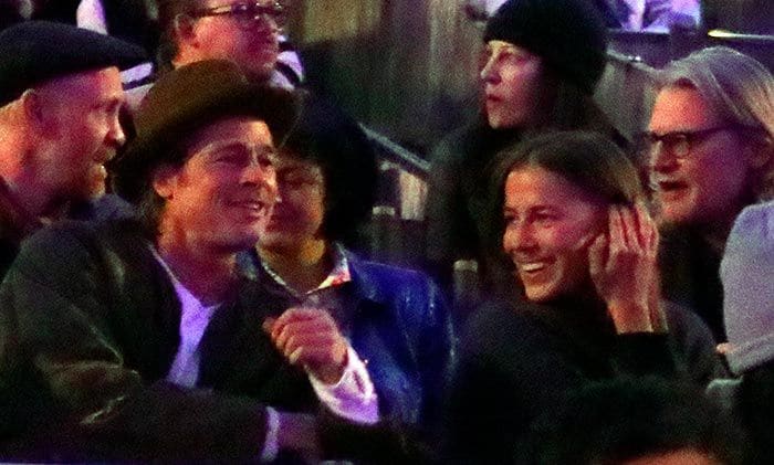 Brad Pitt y Nicole Poturalski