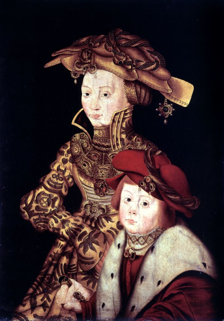 Juana I de Castilla, conocida como Juana la Loca, junto a su hijo Carlos V, futuro emperador del Sacro Imperio Romano Germánico, en una escena que refleja la continuidad dinástica tras Isabel la Católica