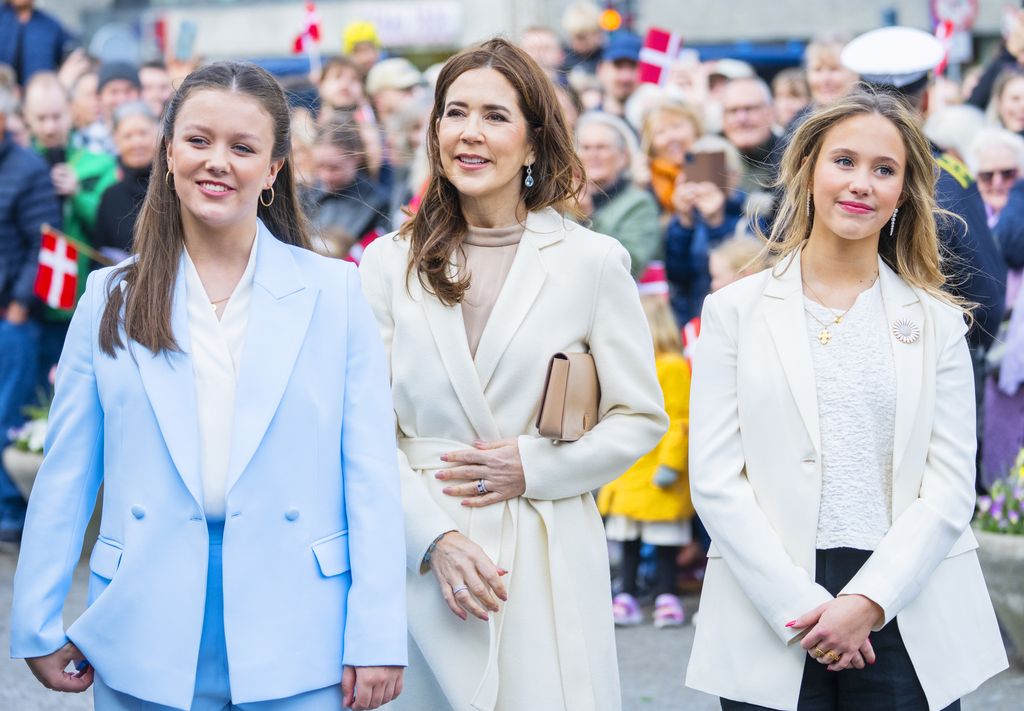 Princess Isabella of Denmark, Queen Mary of Denmark and Princess Josephine of Denmark in front of Aarhus City Hall to celebrate Princess Isabella Of Denmark's 18th birthday on April 11, 2025 in Aarhus, Denmark