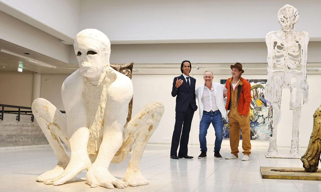 BRAD PITT Y NICK CAVE HOLA4099