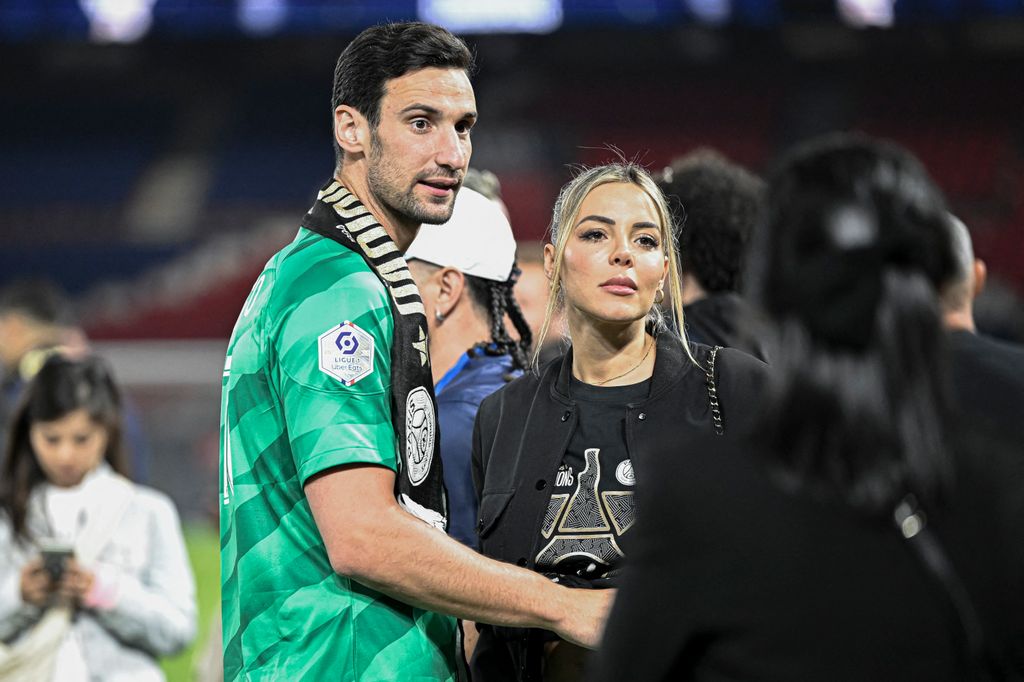Sergio Rico and Alba Silva during the Ligue 1 championship ceremony in Paris on May 12, 2024.