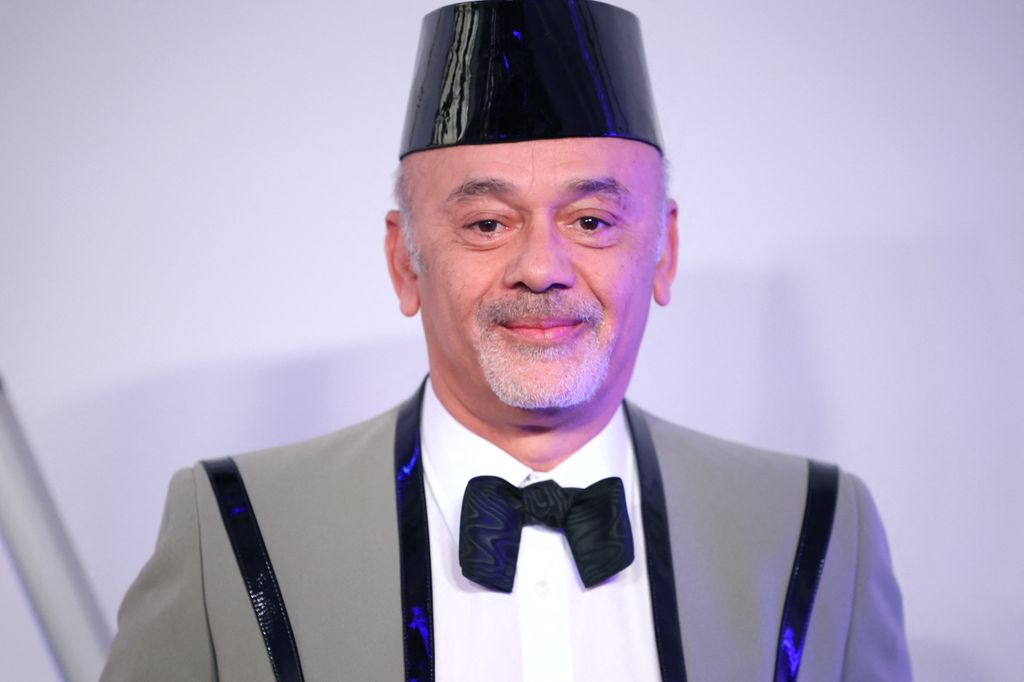 El diseñador francés Christian Louboutin llega al 'Bal de la Rose' 2026