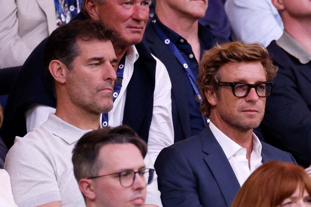 El expiloto Mark Webber y el actor Simon Baker