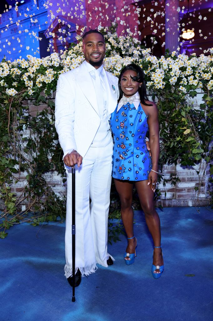 La gimnasta, con su marido Jonathan Owens en un evento