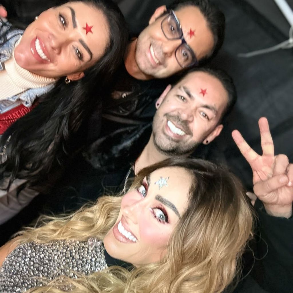 Anahí y Marichelo con Jorge y Ernesto D'Alessio en uno de los shows de RBD.