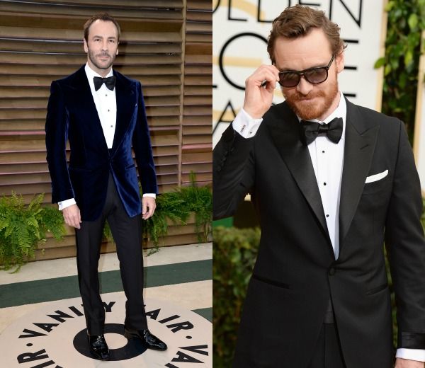 Michael Fassbender, en la red carpet de los Globo de Oro, defendiéndose de los flashes de los fotógrafos con unas gafas de sol. 