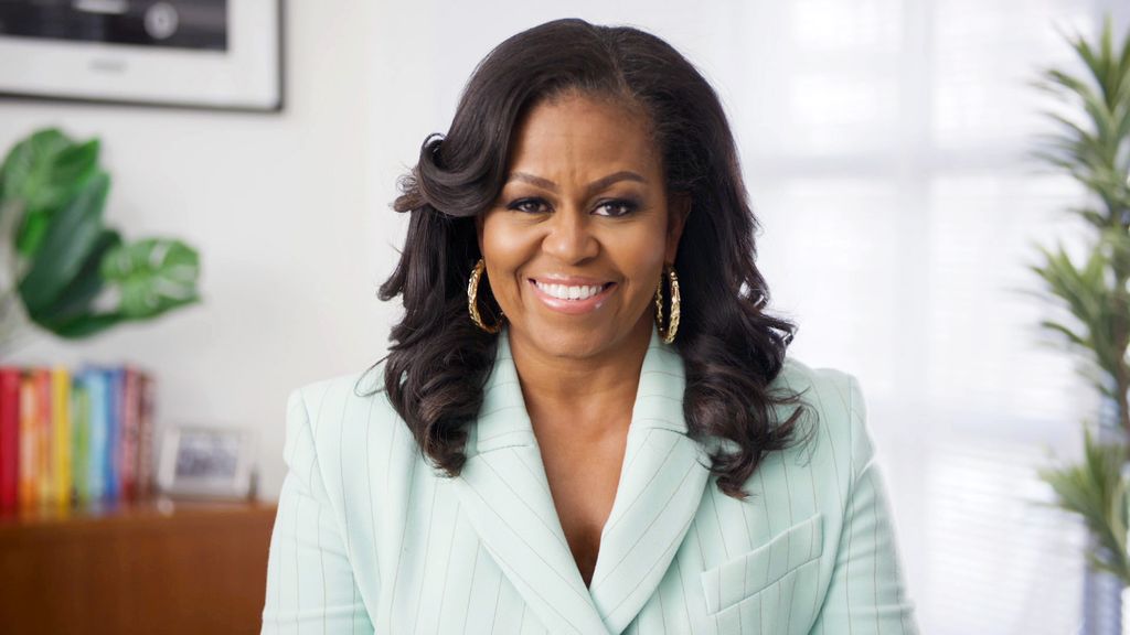 Michelle Obama con traje verde agua clarito