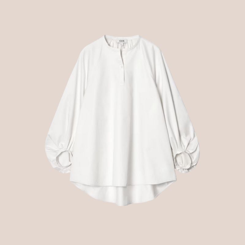 blusa blanca sin cuello y manga abullonada