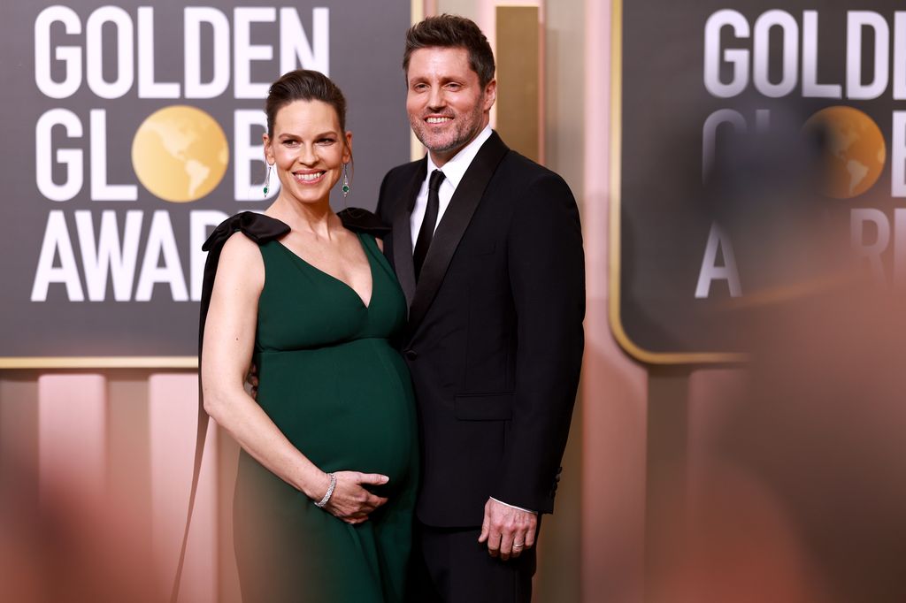 BEVERLY HILLS, CALIFORNIA - JANUARY 10: (L-R) Hilary Swank and Philip Schneider attend the 80th Annual Golden Globe Awards at The Beverly Hilton on January 10, 2023 in Beverly Hills, California. (Photo by Matt Winkelmeyer/FilmMagic)