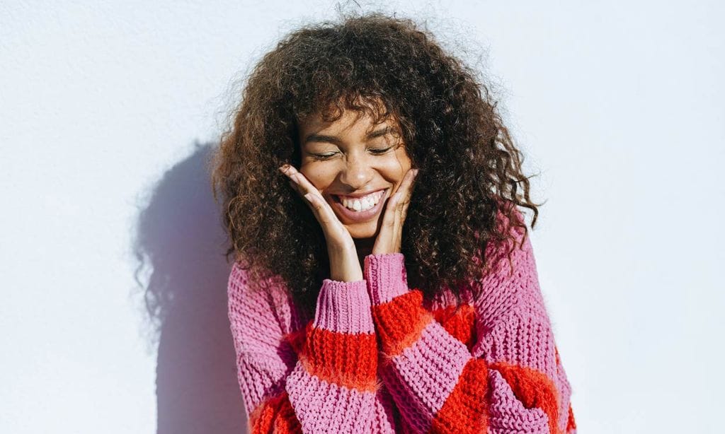 getty chica feliz